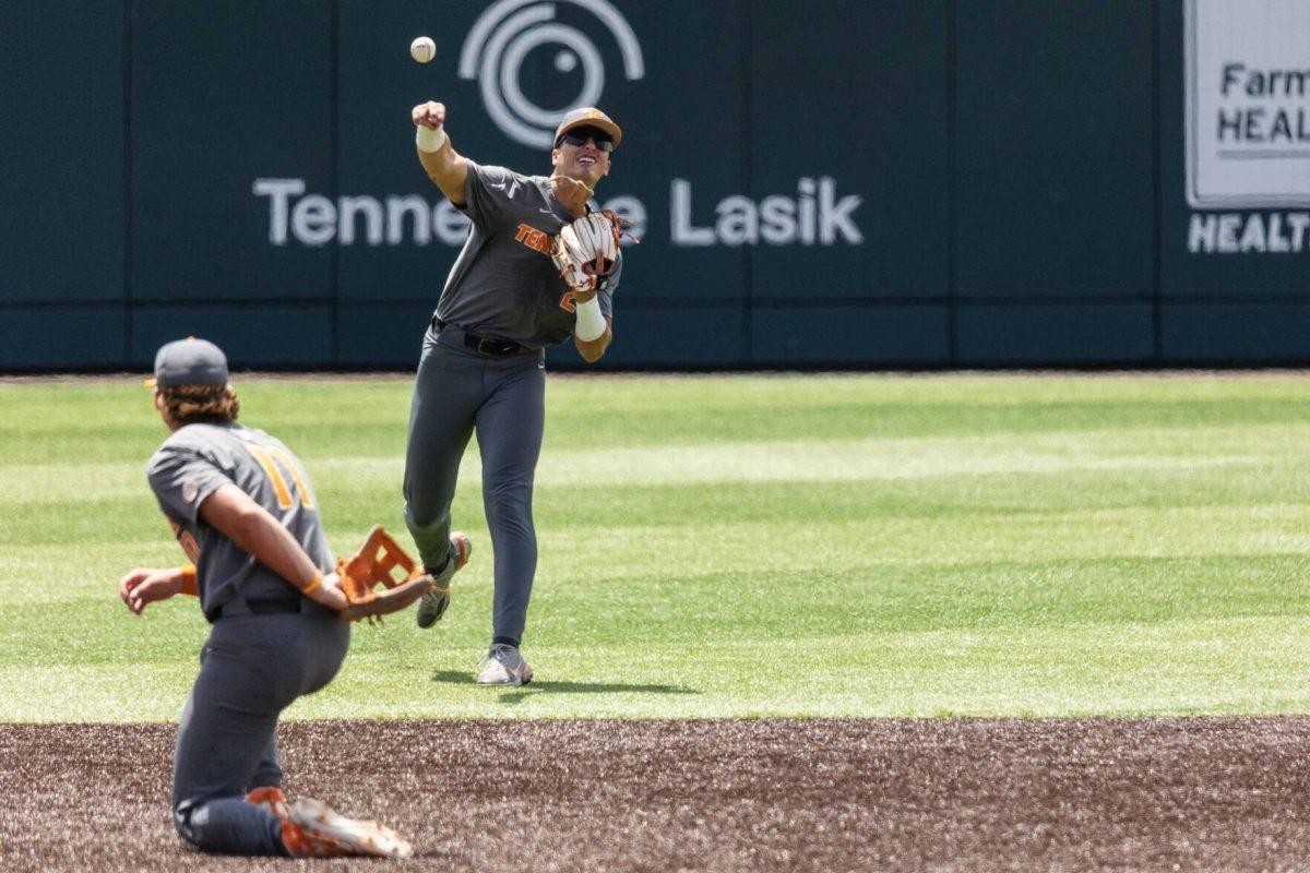 Dean Curley (23) throws to first during game against Evansville at Lindsey Nelson Stadium. Saturday, June 8, 2024.