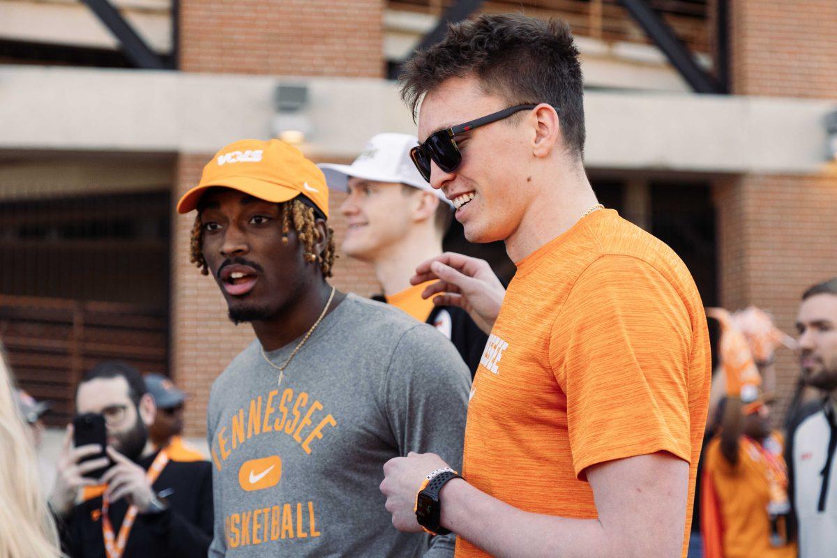 Dalton Knecht, right and Jahmai Mashack during the Vol Walk before the Orange and White game at Neyland Stadium. Saturday, April 13, 2024.
