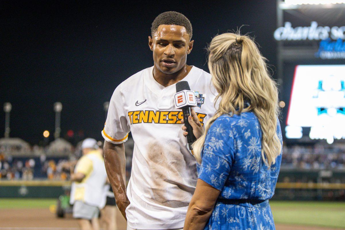 Christian Moore (1) is interviewed following a College World Series game victory over Florida State at Charles Schwab Field. Friday, June 14, 2024.