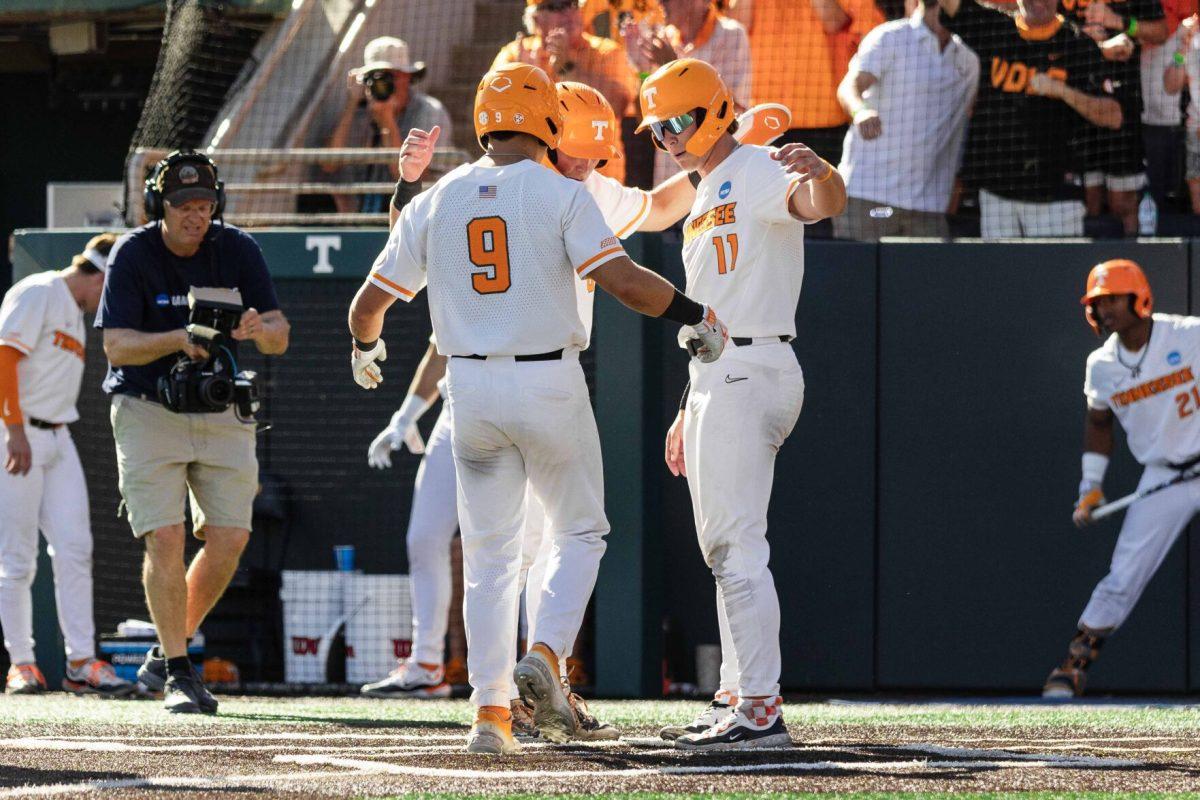 Vols' celebrate Hunter Ensley's (9) three-run home run during game against Evansville at Lindsey Nelson Stadium. Friday, June 7, 2024.