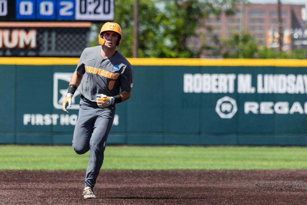 Dylan Dreiling (8) rounding bases after home run during game against Evansville at Lindsey Nelson Stadium. Saturday, June 8, 2024.
