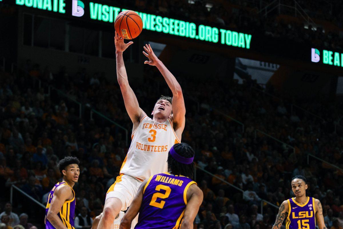 Dalton Knecht (3) gets fouled against LSU in the Food City Center. Wednesday, Feb. 7, 2024. 