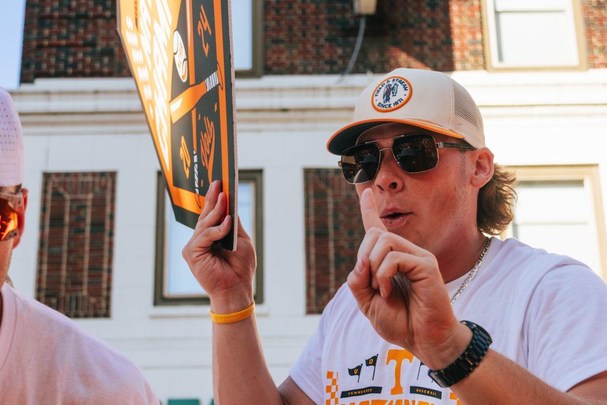 Billy Amick (11) celebrates during the National Champion Volunteers parade. Tuesday, June 25, 2024. 