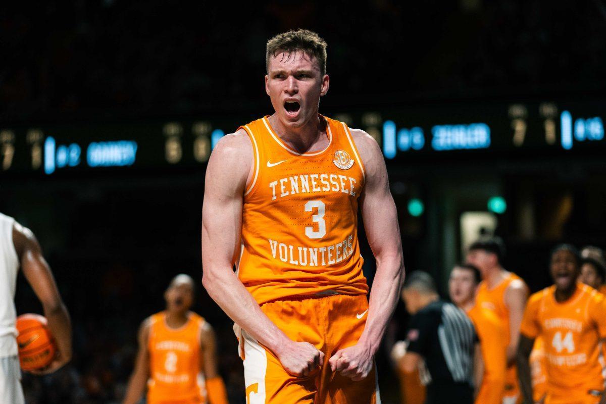 Dalton Knecht (3) flexes after an and-one bucket against Vanderbilt in Memorial Gymnasium. Saturday, Jan. 27, 2023.