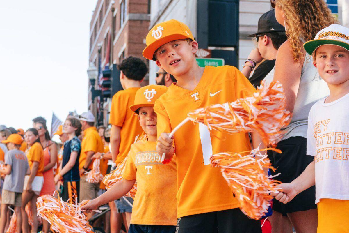 Young Volunteer Fans wait eagerly before the National Champion Volunteers parade. Tuesday, June 25, 2024. 