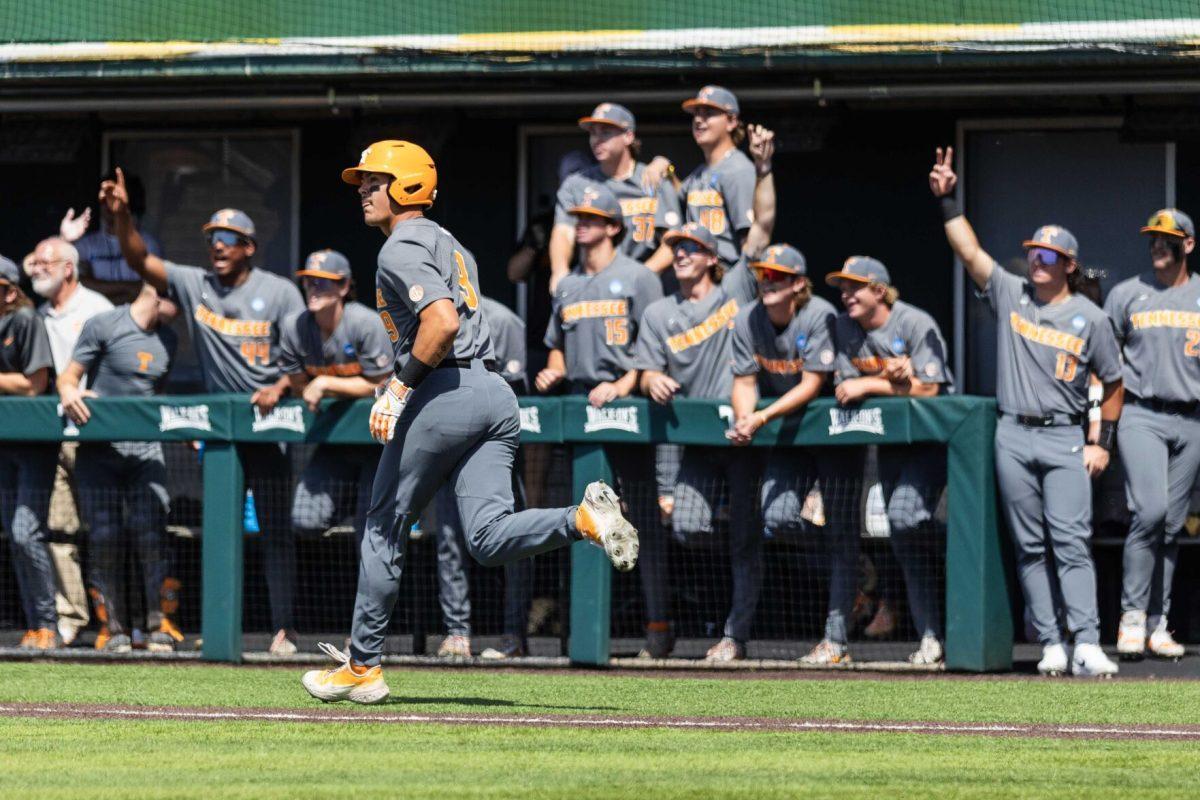 The Vols' dugout celebrates after Hunter Ensley (9) hits a home run during game against Evansville at Lindsey Nelson Stadium. Saturday, June 8, 2024.