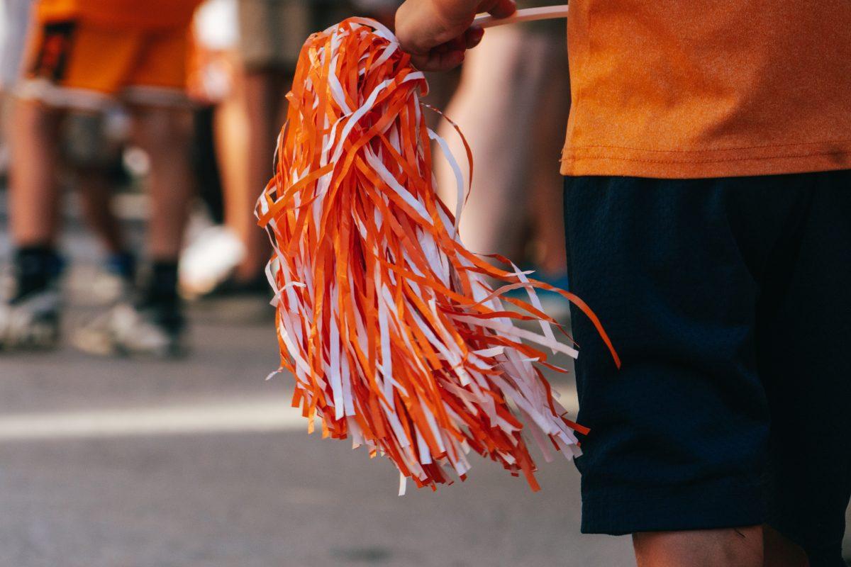 Young Volunteer Fan waits eagerly before the National Champion Volunteers parade. Tuesday, June 25, 2024. 