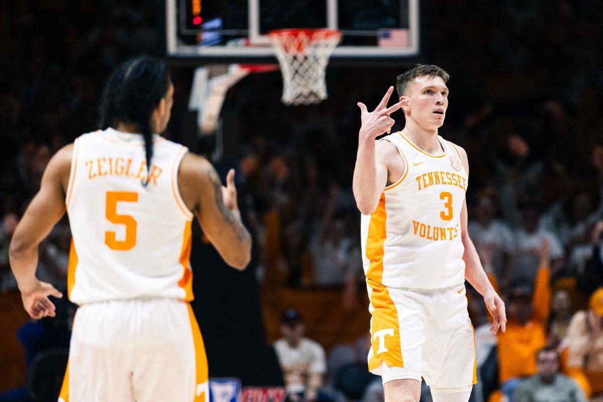 Dalton Knecht (3) scores a three-pointer against Texas A&amp;M at Food City Center. Saturday, Feb. 24, 2024.