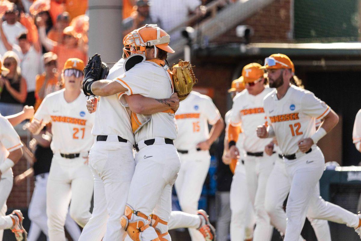 Aaron Combs (28) and Cal Stark (10) embrace aftrer game one victory against Evansville at Lindsey Nelson Stadium. Friday, June 7, 2024.