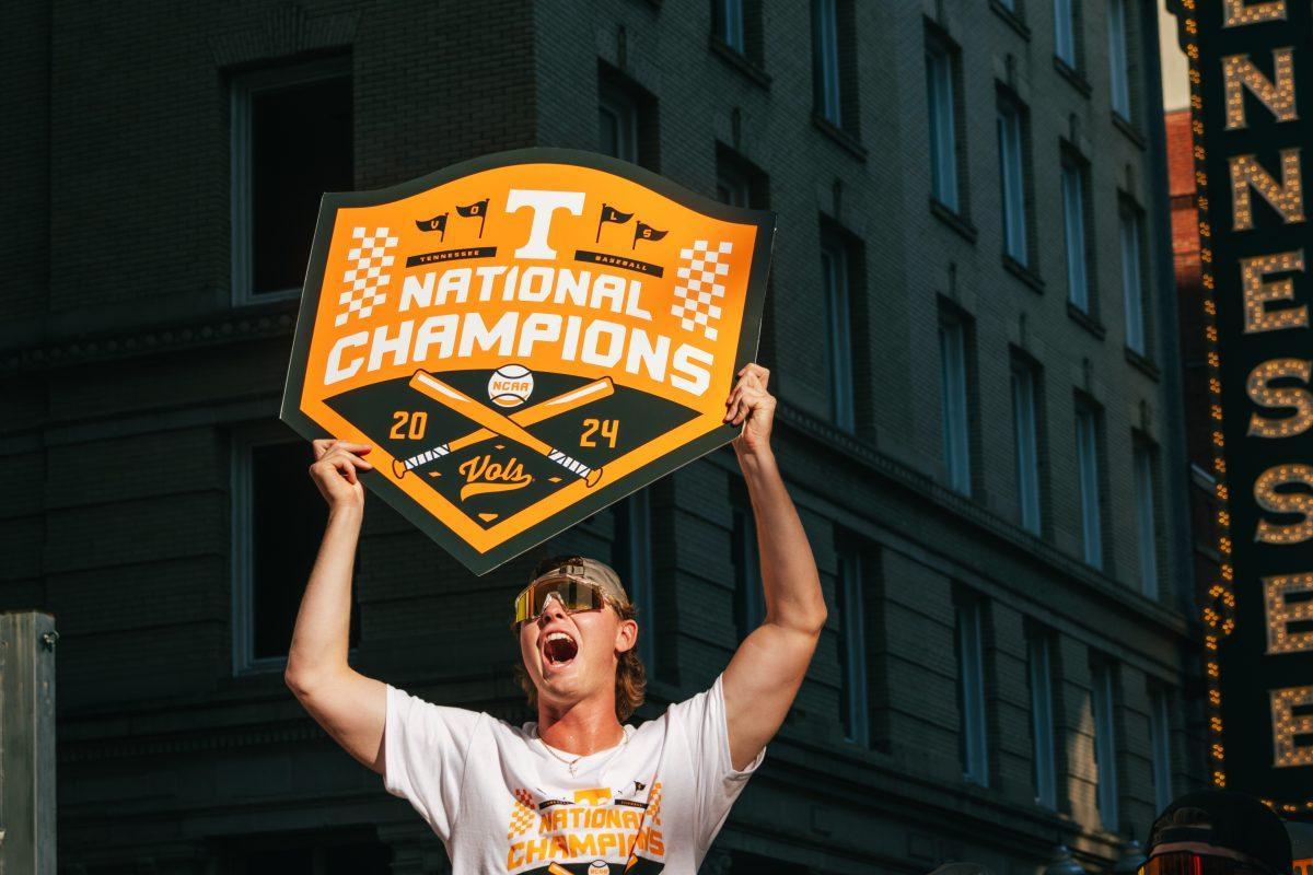 Alex Perry (4) celebrates during the National Champion Volunteers parade. Tuesday, June 25, 2024. 