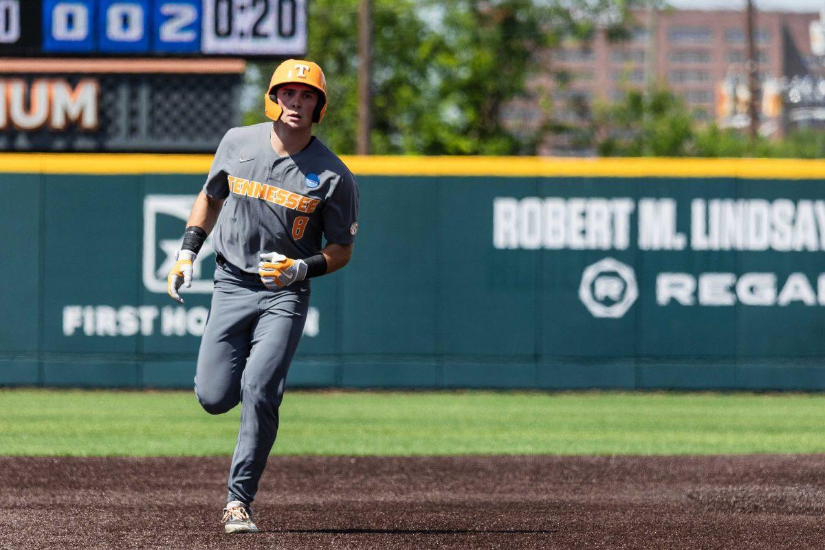Dylan Dreiling (8) rounding bases after home run during game against Evansville at Lindsey Nelson Stadium. Saturday, June 8, 2024.