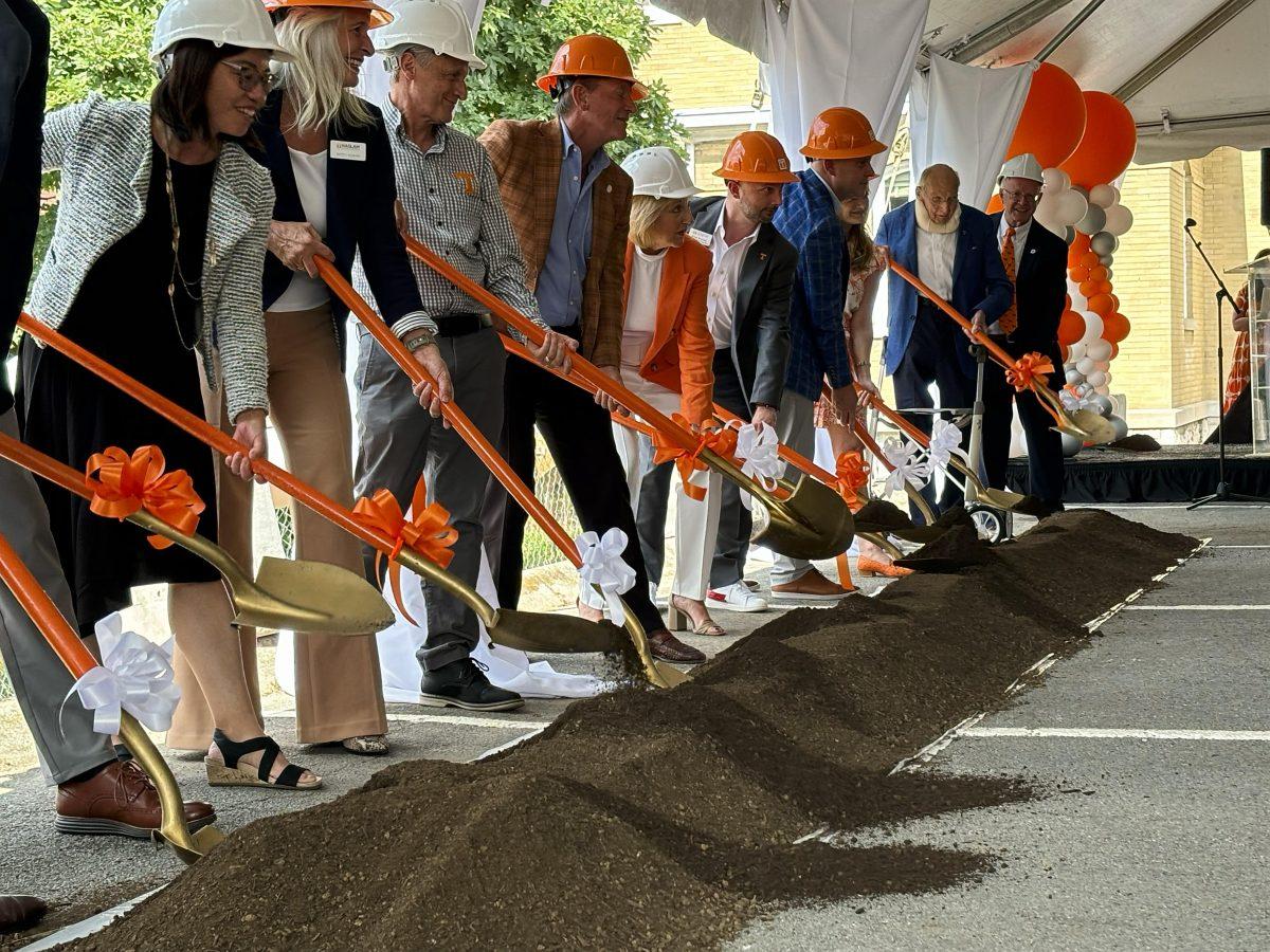 UT leaders participating in a ceremonial dig at the new Haslam College of Business building groundbreaking ceremony on Aug. 21, 2024. 
