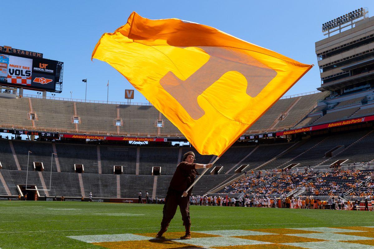 Davy Crockett waves the flag after a touchdown during the Orange and White game at Neyland Stadium. Saturday, April 13, 2024.