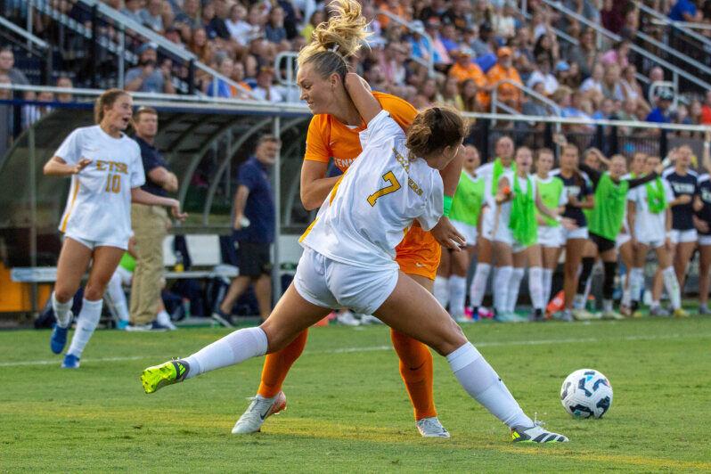 Kate Runyon (7) battles a defender during a game against East Tennessee State University at Summers-Taylor Stadium. Friday, Aug. 22, 2024.