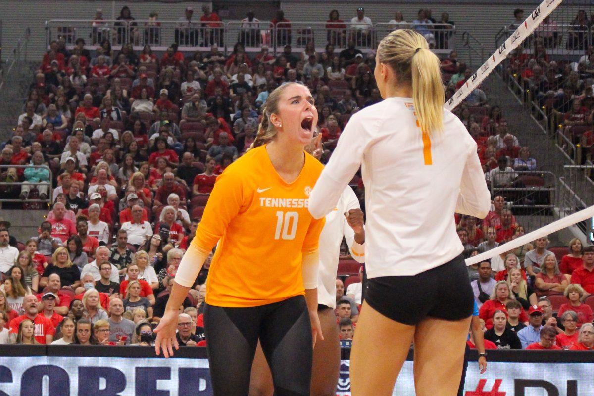 Ashllyn King (10) cheers after a successful block during a match against Louisville at the KFC Yum! Center. Sunday, Sep. 1, 2024.