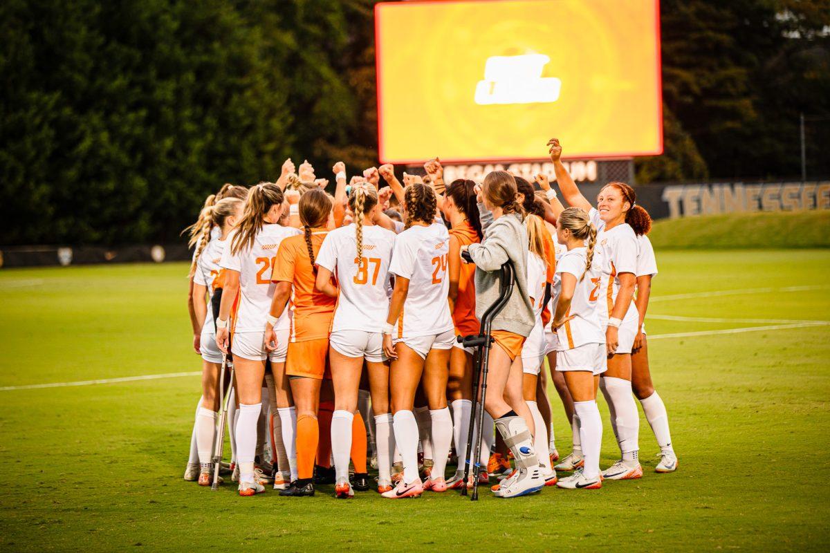 The Lady Vols huddling up before a match against Memphis at Regal Soccer Stadium. Thursday, Sept. 12, 2024.