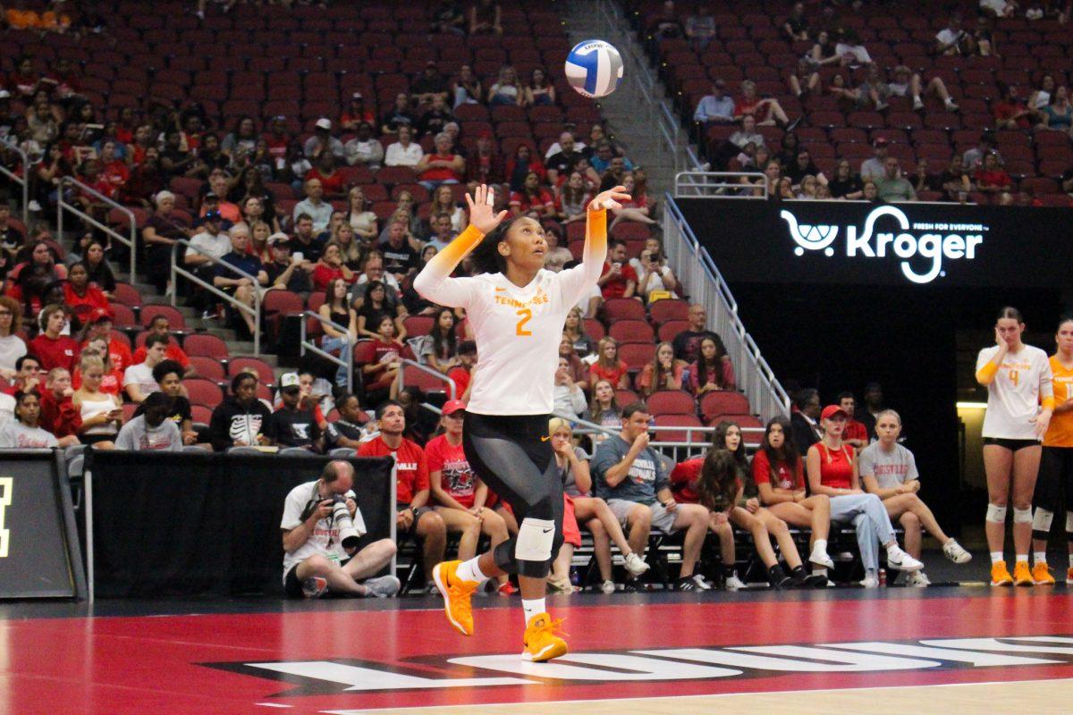 Eryn Jones (2) serves during a match against Louisville at the KFC Yum! Center. Sunday, Sept. 1, 2024.