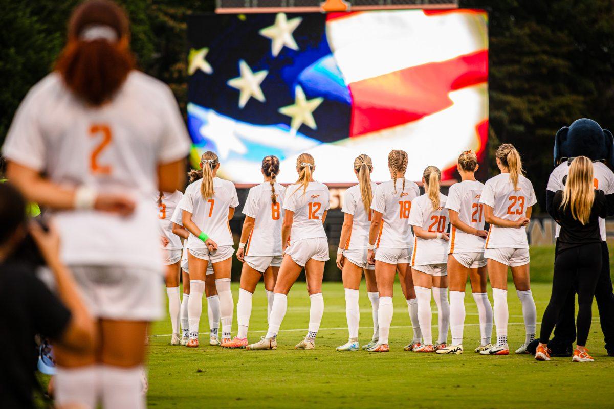 The Lady Vols during the national anthem before a match against Memphis at Regal Soccer Stadium. Thursday, Sept. 12, 2024.