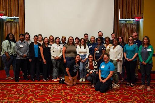Mental health professionals across the UT System collaborate during a working session at the 2024 UT System Mental Health Retreat.