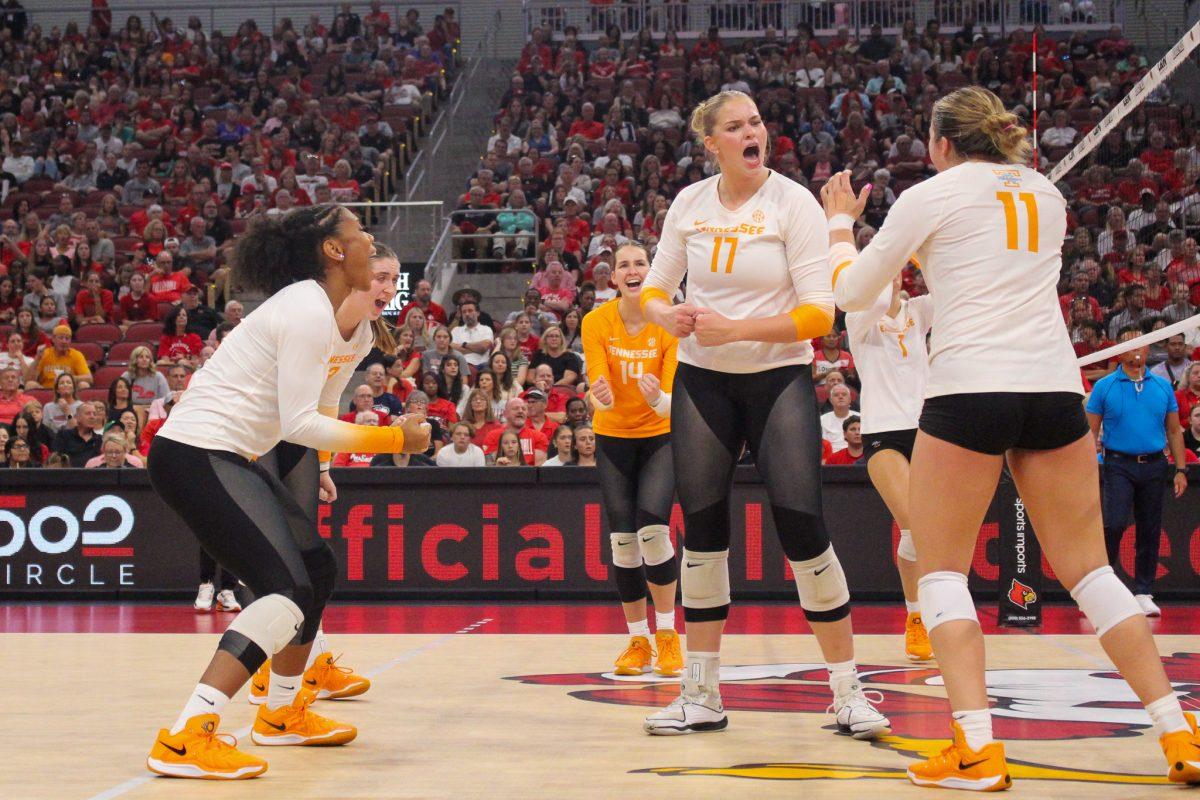 Vols celebrate after securing a point during a match against Louisville at the KFC Yum! Center. Sunday, Sept. 1, 2024.