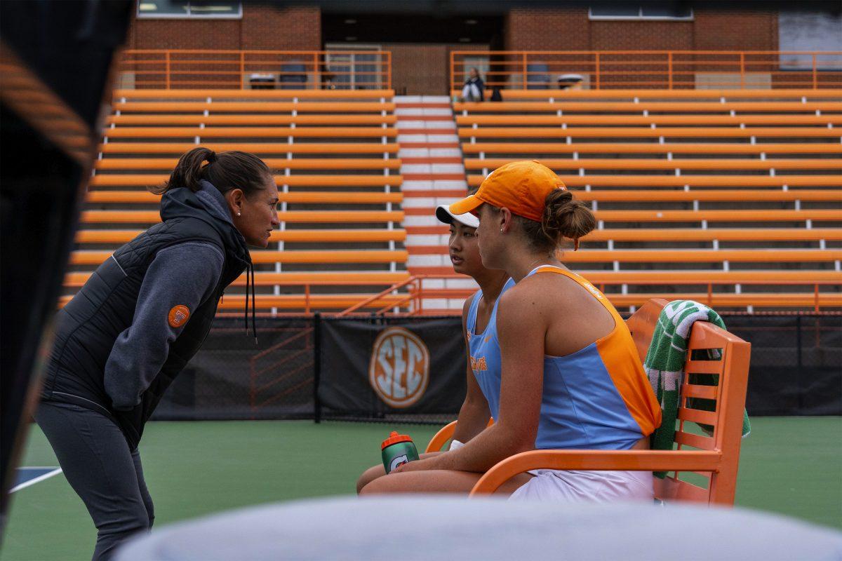 Alison Ojeda talks to Elim Yan and Maeve Thornton before their next set at Barksdale Stadium. Sunday, Oct. 27, 2024.