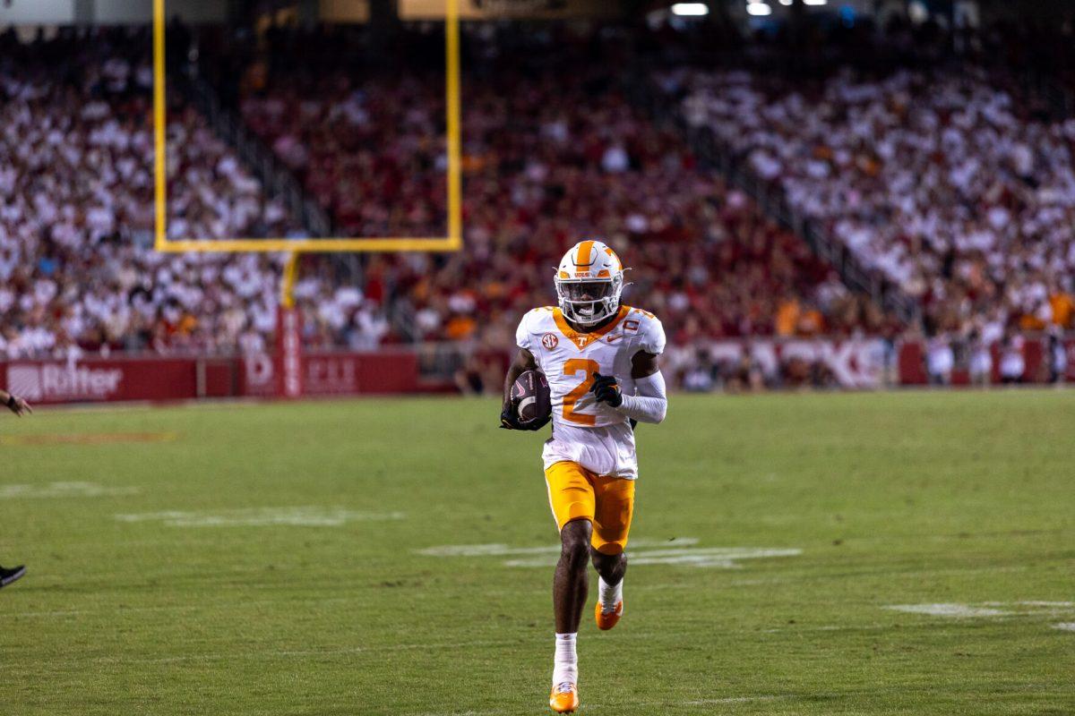 Andre Turrentine (2) runs with the ball before a penalty is called  during a game against Arkansas at Donald W. Reynolds Razorback Stadium. Saturday, Oct. 5, 2024. 