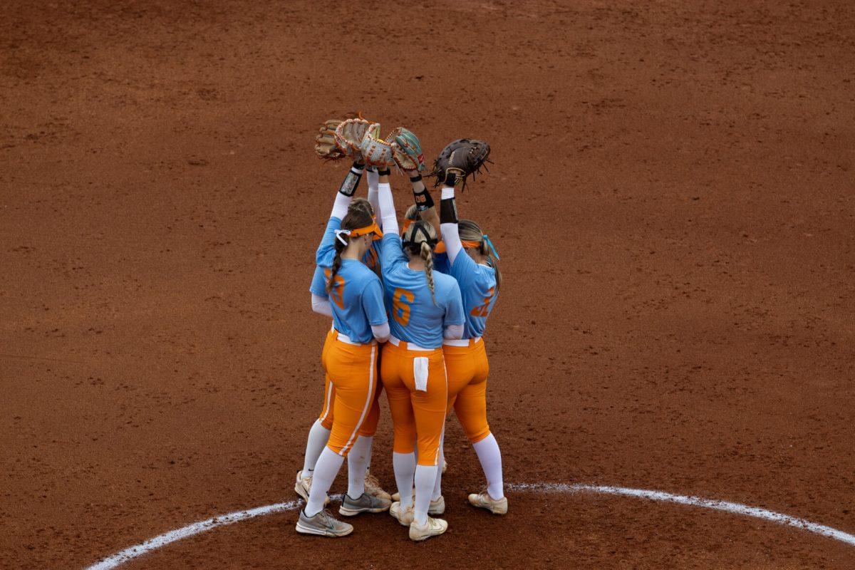 Lady Vol Softball Team does pre-inning ritual against Georgia Tech at Sherri Parker Lee Stadium. Saturday, Sept. 28, 2024