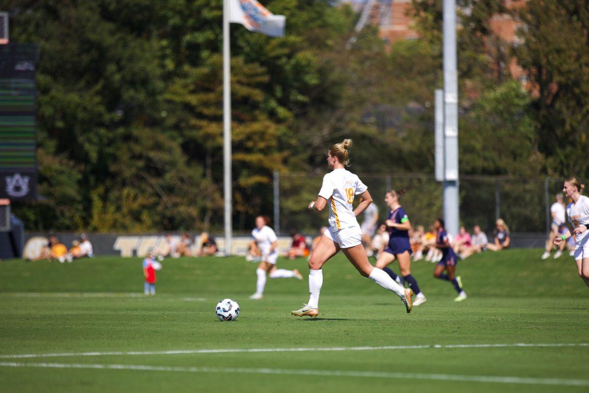 Ally Brown (18) dribbles the ball downfield against Auburn at Regal Soccer Stadium. Sunday, Oct. 13, 2024.