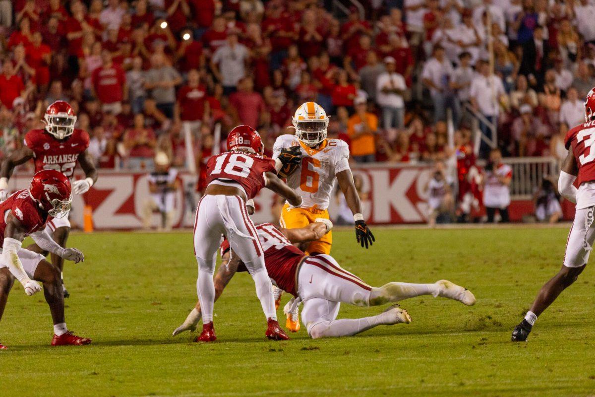 Dylan Sampson (6) evades the Arkansas defense during a game at Donald W. Reynolds Razorback Stadium. Saturday, Oct. 5, 2024.