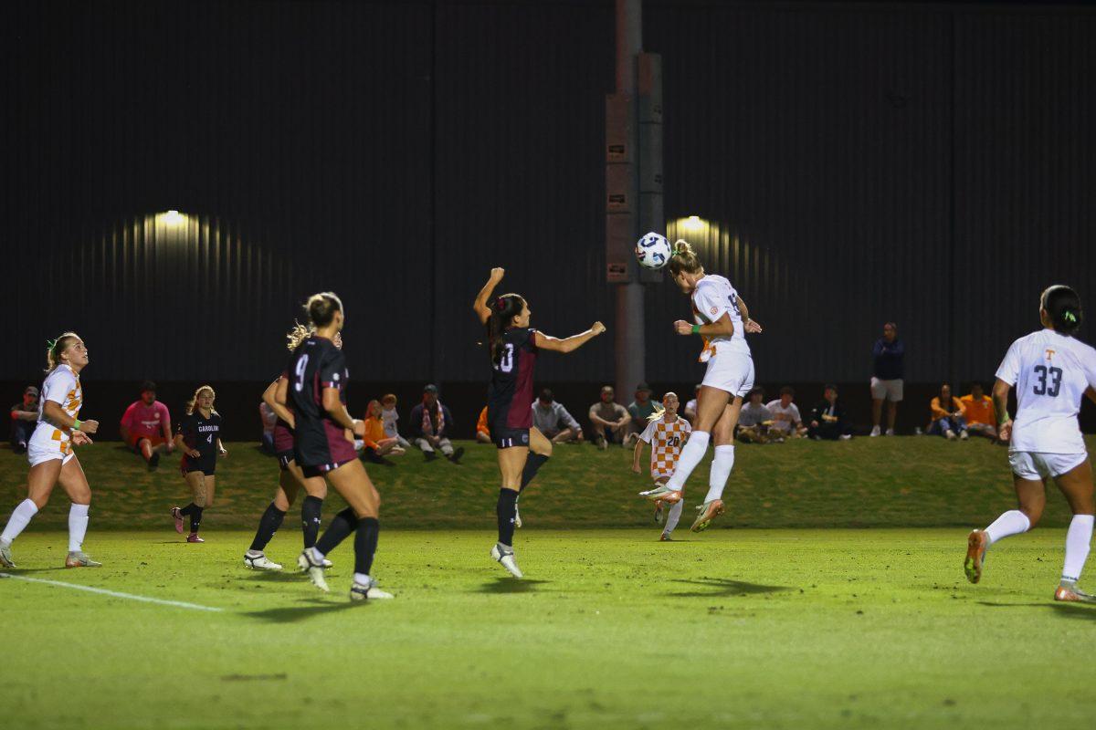 Kennedy Price (15) heads the ball against South Carolina at Regal Soccer Stadium. Thursday, Oct. 24, 2024.