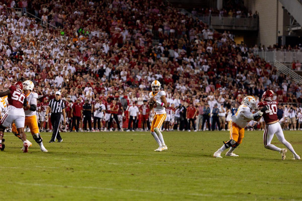 Nico Iamaleava (8) looks to pass during a game against Arkansas at Donald W. Reynolds Razorback Stadium. Saturday, Oct. 5, 2024. 