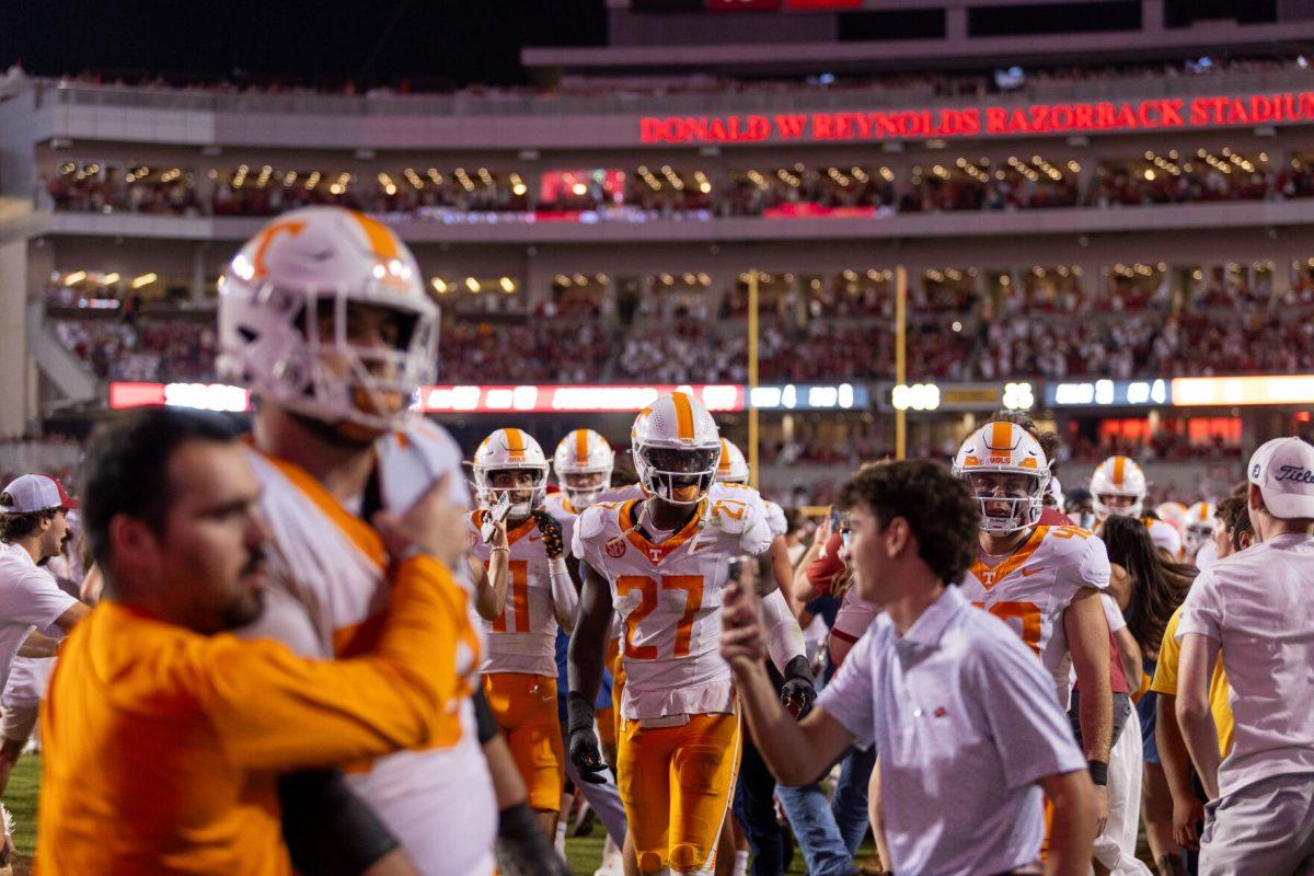James Pearce Jr. (27) exits the field as fans storm after a game against Arkansas at Donald W. Reynolds Razorback Stadium. Saturday, Oct. 5, 2024. 