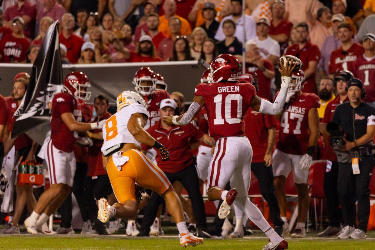 Kalib Perry (8) pursues an Arkansas quarterback during a game at Donald W. Reynolds Razorback Stadium. Saturday, Oct. 5, 2024.