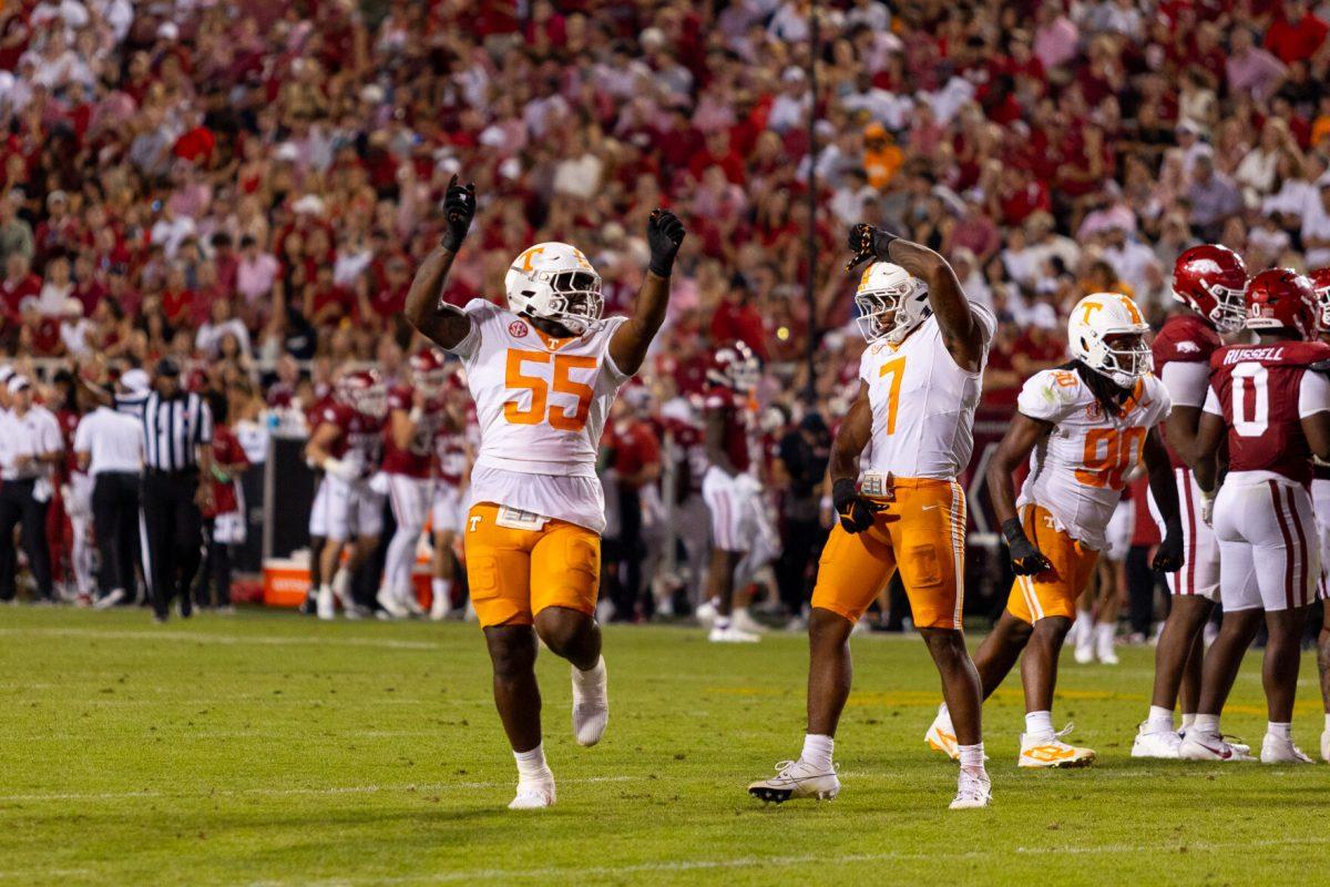 Arion Carter (7) and Omarr Norman-Lott (55) celebrate during a game against Arkansas at Donald W. Reynolds Razorback Stadium. Saturday, Oct. 5, 2024. 