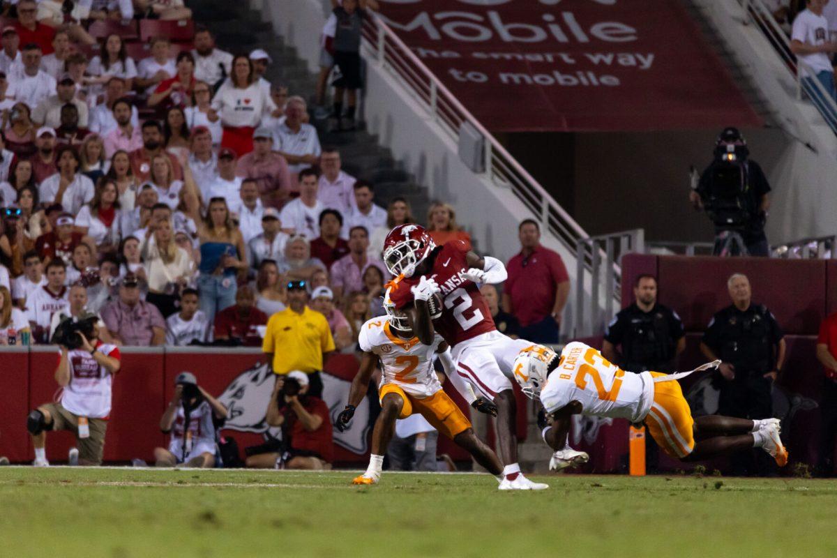 Boo Carter (23) makes a tackle during a game against Arkansas at Donald W. Reynolds Razorback Stadium. Saturday, Oct. 5, 2024.