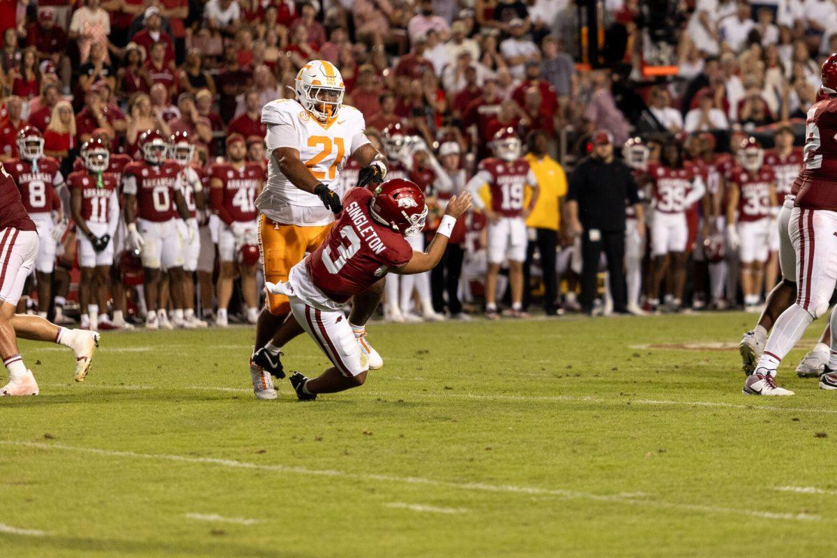 Omari Thomas (21) pushes down the Arkansas quarterback  during a game against Arkansas at Donald W. Reynolds Razorback Stadium. Saturday, Oct. 5, 2024. 