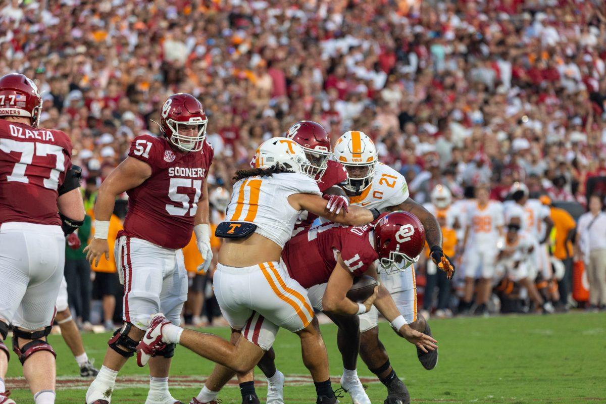 Keenan Pili (11) makes a tackle during a game against Oklahoma at Gaylord Family - Oklahoma Memorial Stadium in Norman. Saturday, Sept. 21, 2024.