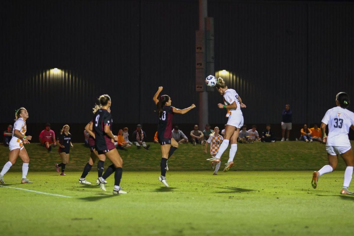 Kennedy Price (15) heads the ball against South Carolina at Regal Soccer Stadium. Thursday, Oct. 24, 2024.
