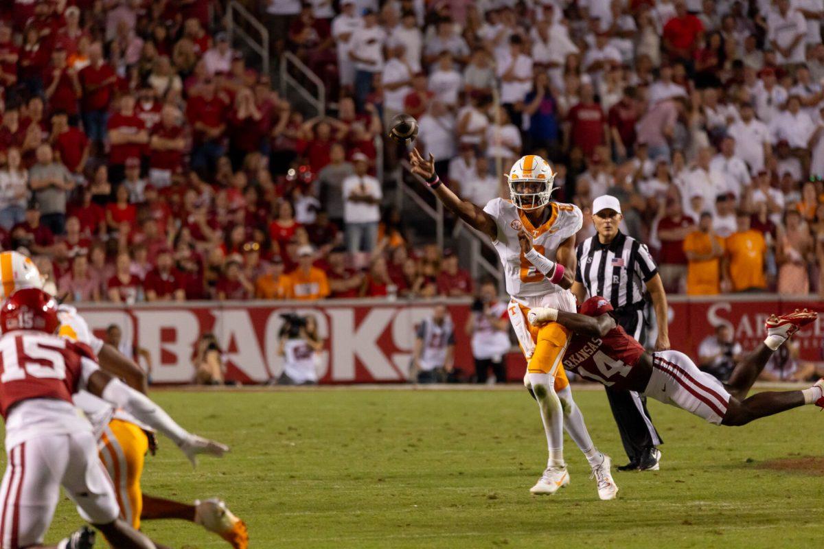 Nico Iamaleava (8) throws a pass during a game against Arkansas at Donald W. Reynolds Razorback Stadium. Saturday, Oct. 5, 2024.