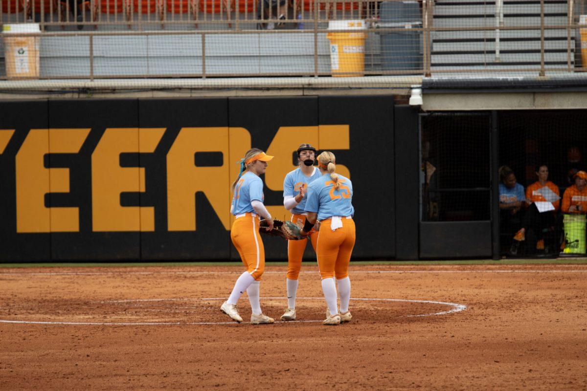 First Baseman Aubrey Barnhart (32), Second Baseman Ella Dodge (25), and Pitcher Sage Mardjetko (6) celebrate a strike out against Georgia Tech at Sherri Parker Lee Stadium. Saturday, Sept. 28, 2024