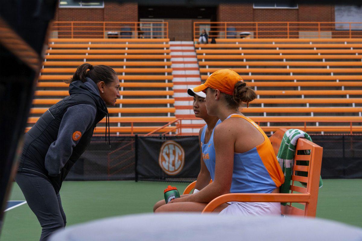 Alison Ojeda talks to Elim Yan and Maeve Thornton before their next set at Barksdale Stadium. Sunday, Oct. 27, 2024.
