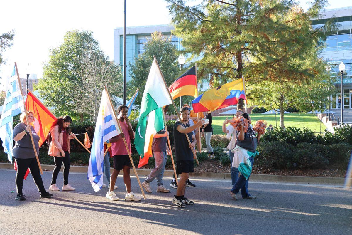 International Student and Scholar Services march ainthe homecoming parade. Friday, Nov 8, 2024 .