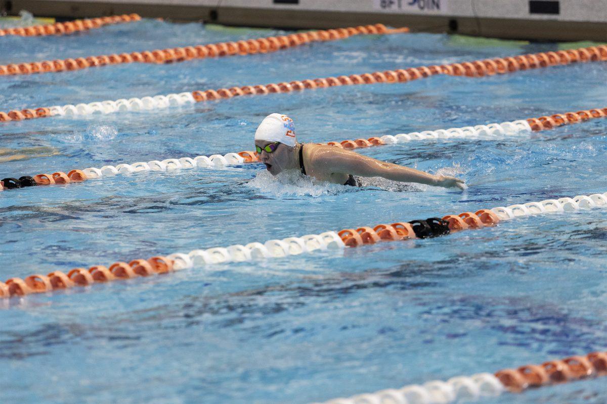 Ella Jansen races in a heat of the women's 200 meter butterfly at the Tennessee invitational at the Allan Jones Intercollegiate Aquatic Center. Friday, Nov. 22, 2024.