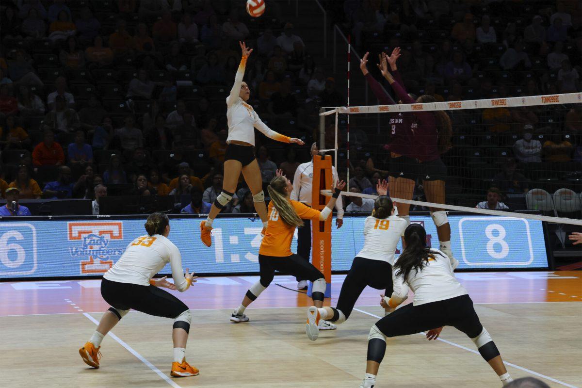 Nina Cajic (1) goes up for a hit against Texas A&amp;M at Thompson-Boling arena. Sunday, Nov. 10, 2024.