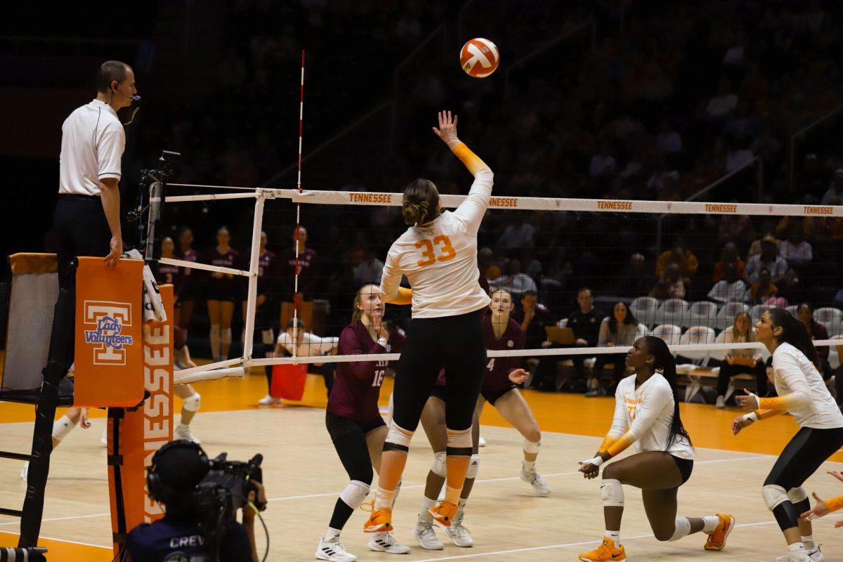 Hayden Kubik (33) goes up for a spike against Texas A&amp;M at Thompson-Boling Arena at Food City Center. Sunday, Nov. 10, 2024.