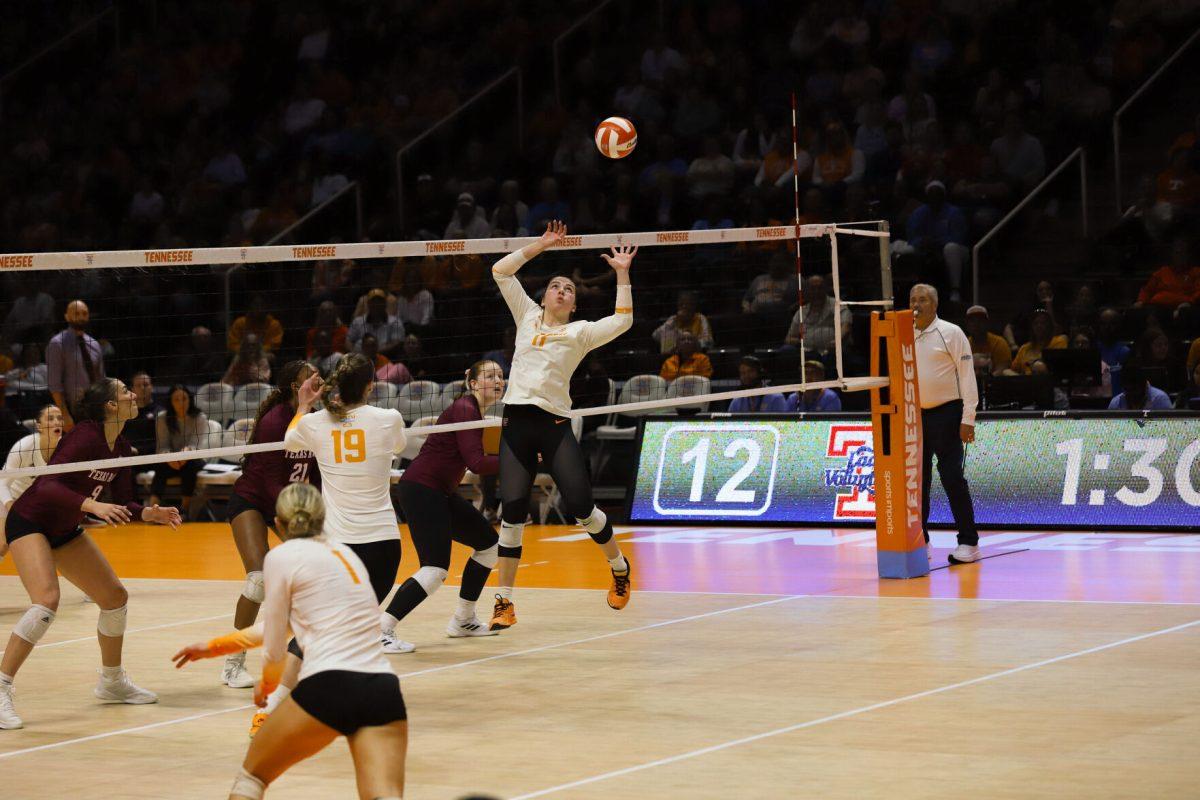 Caroline Kerr (11) backsets to a teammate against Texas A&amp;M at Thompson-Boling Arena at Food City Center. Sunday, Nov. 10, 2024.