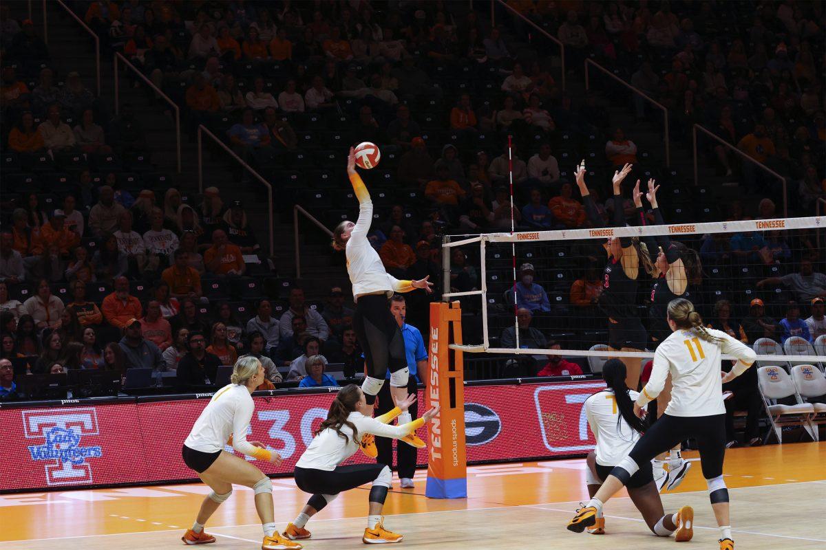 Hayden Kubik (33) spikes the ball against Georgia at Thompson-Boling Arena. Friday, Nov. 15, 2024.