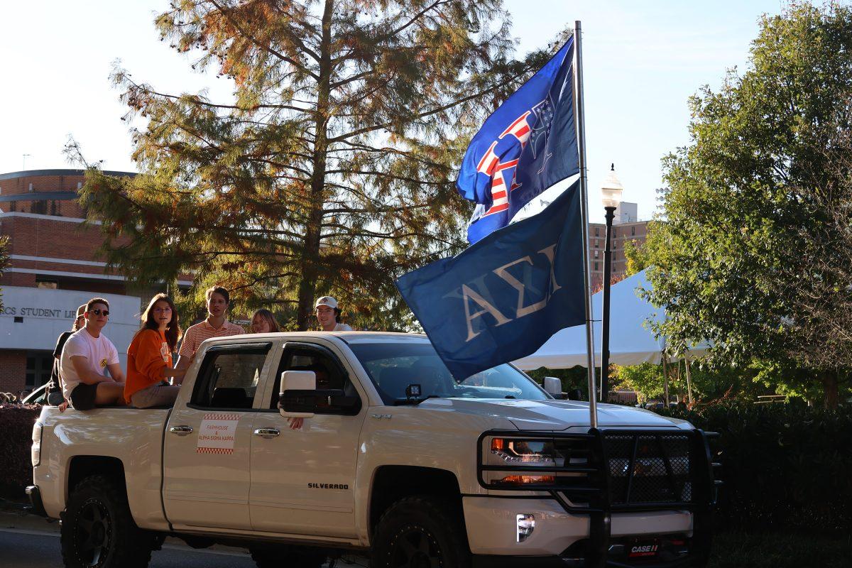 FarmHouse and Alpha Sigma Kappa members participate in the 2024 Homecoming Parade. Friday, Nov. 8, 2024.