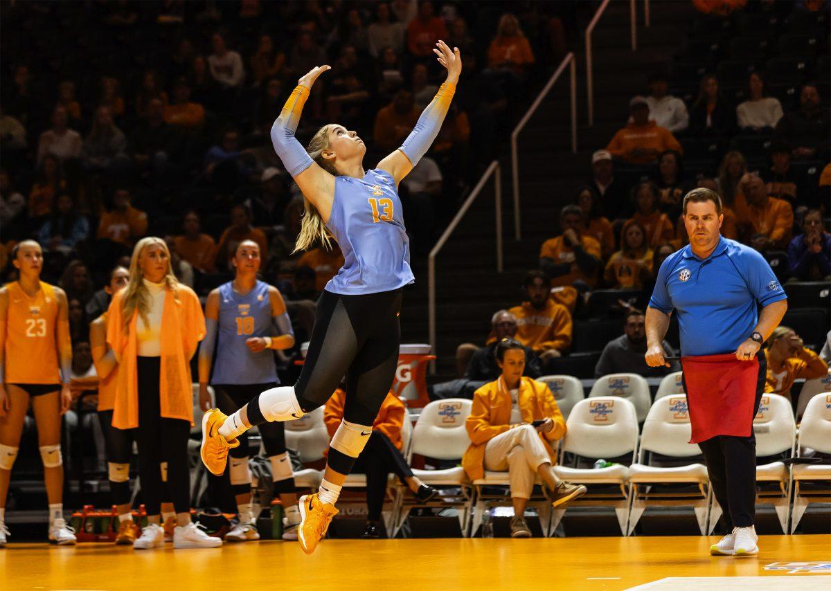 Katie Barrier (13) prepares to serve the ball to Kentucky at Thompson-Boling Arena at Food City Center. Wednesday, Oct. 16, 2024.