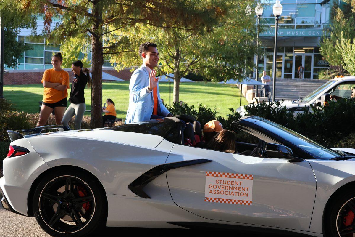 SGA Student Body Predident Dante Grayson waves to the homecoming crowd. Friday, Nov. 8, 2024.